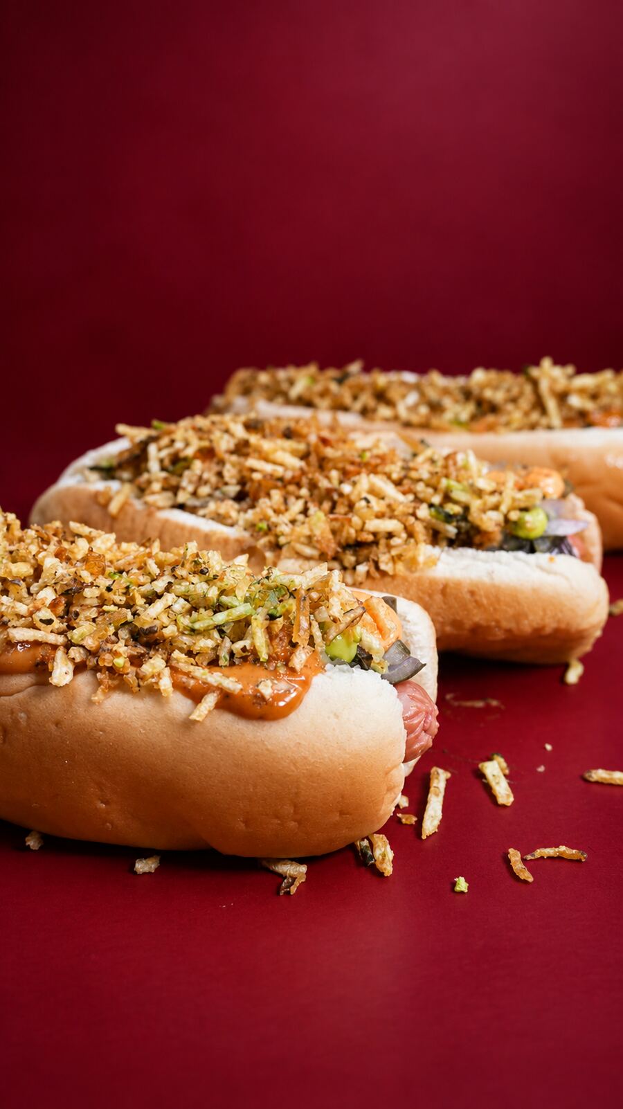 Perros calientes quesudos con ripio de papa
